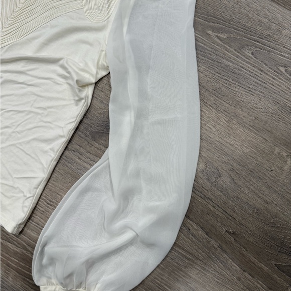 Gracia Ivory Textured Blouse with Sheer Accents - Picture 4 of 5